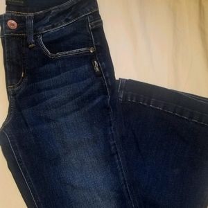 Silver jeans trouser leg